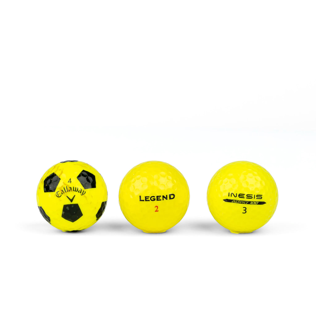 Colored golf balls (pink, orange, yellow)