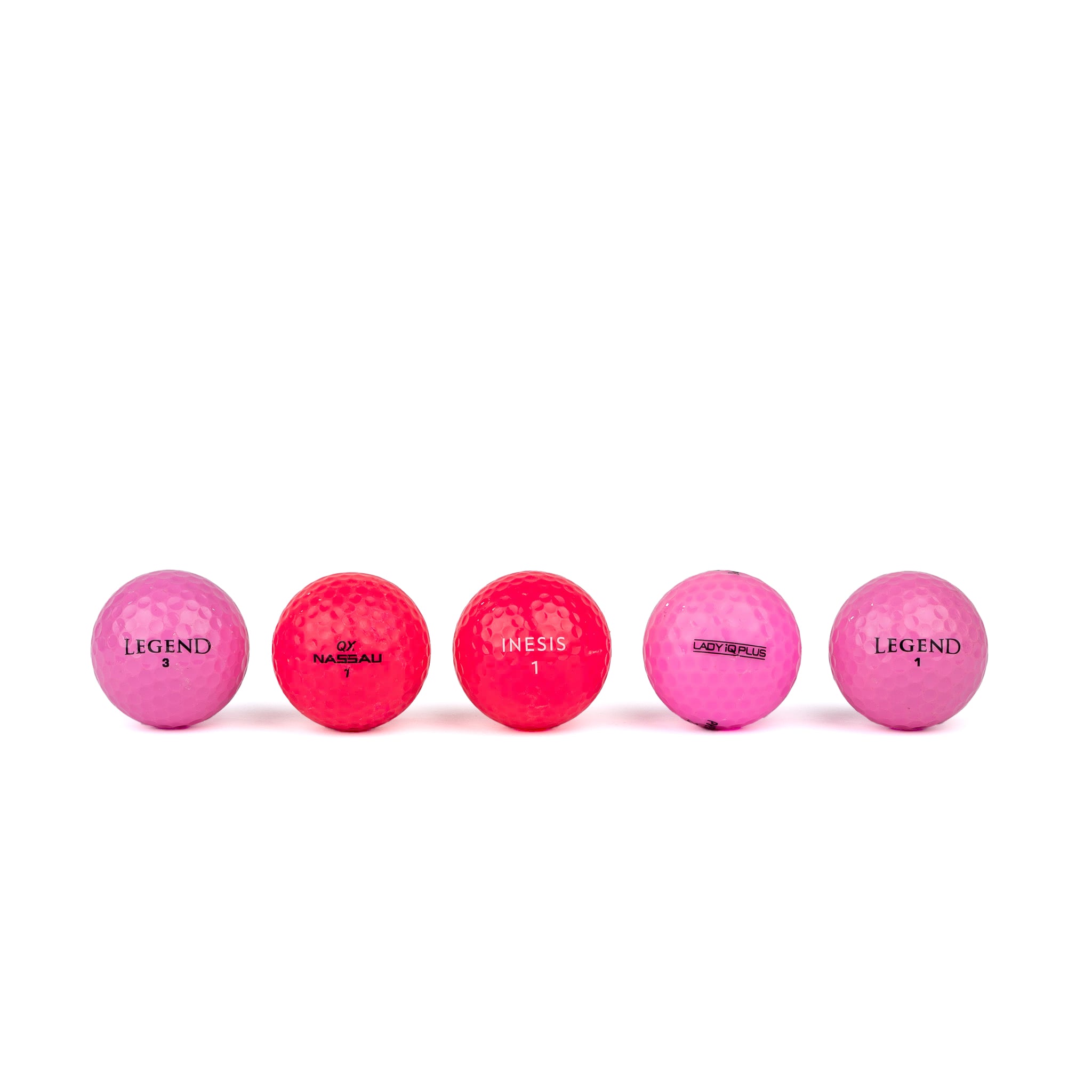 Colored golf balls (pink, orange, yellow)